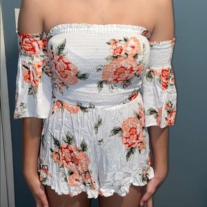 Romper with detachable sleeves